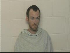 Mugshot of REED, DUSTIN